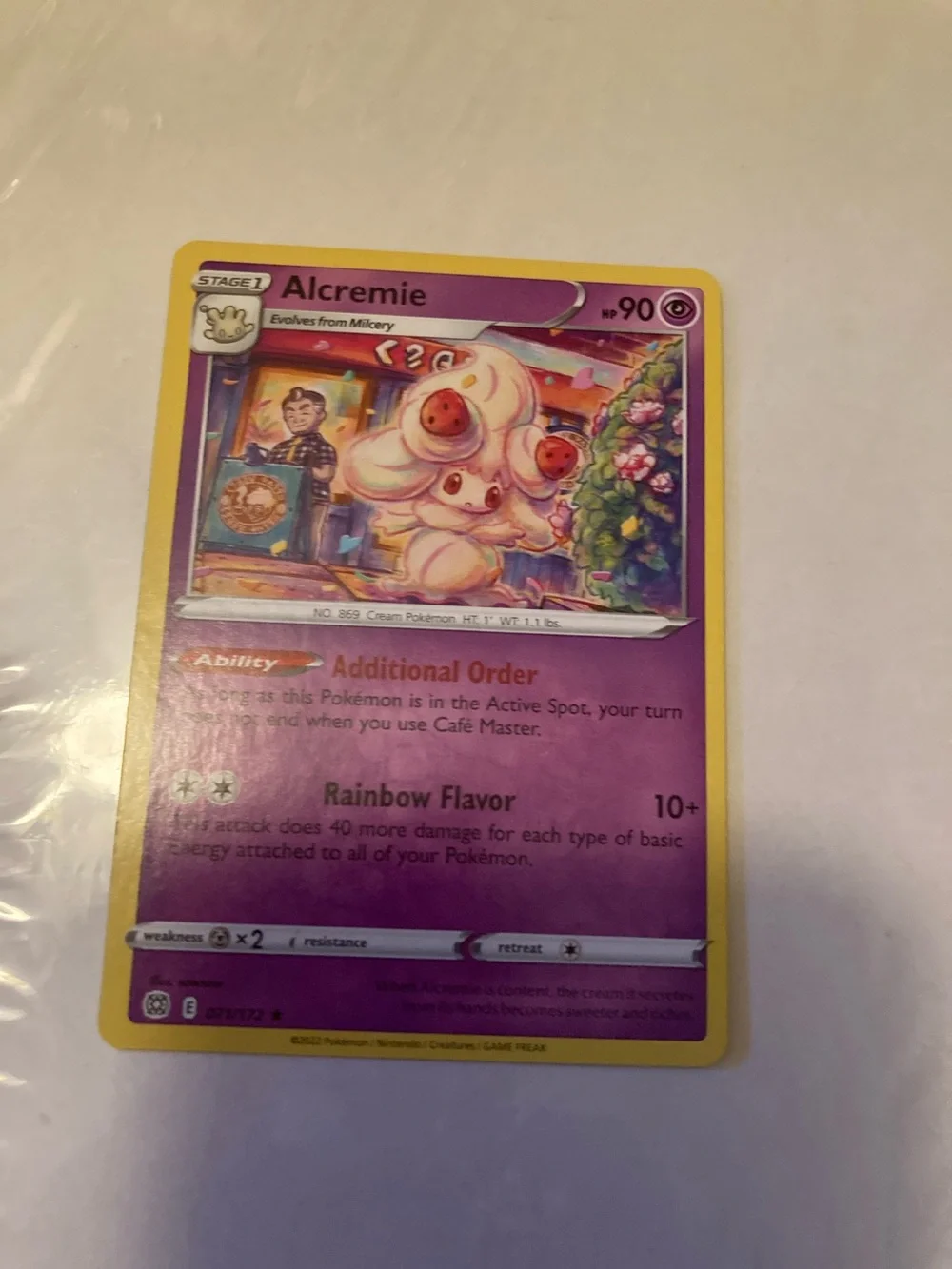 Pokemon Alcremie Trading Card - Purple, Yellow, Pink